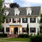 The two story white colonial A'Tuscan Estate