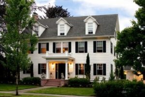 The two story white colonial A'Tuscan Estate