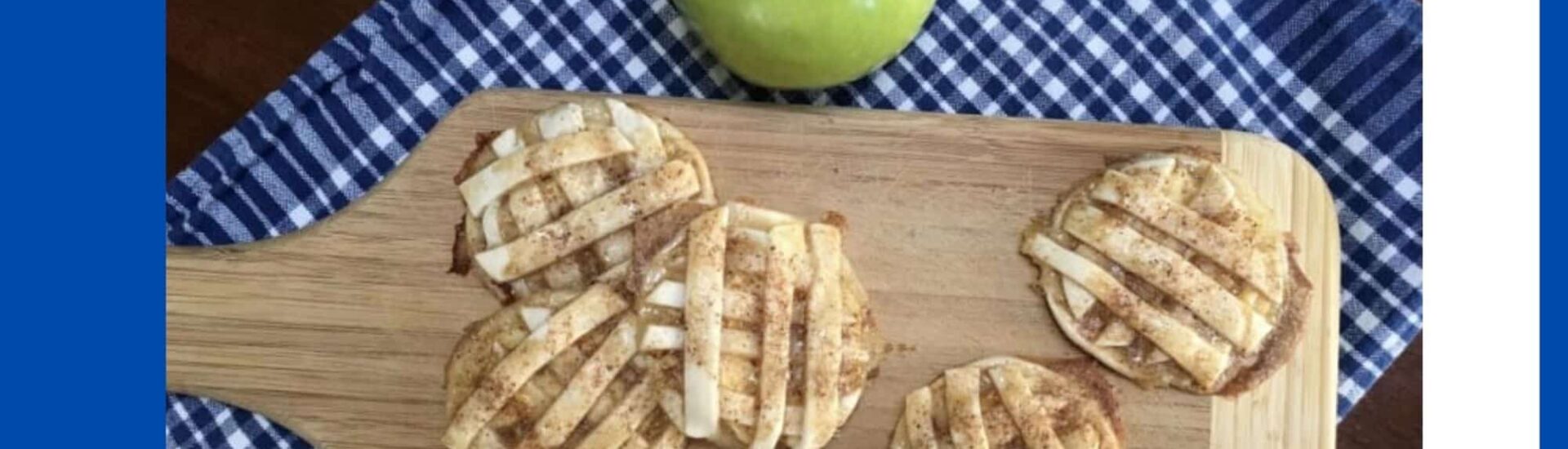 Apple Pie Cookies on a wooden board with a fresh green apple