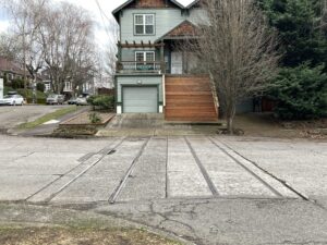 Streetcar rails at 26th and Morrison seemingly goes strait into a house