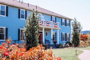 Blue house with dark trim La Bastide exterior