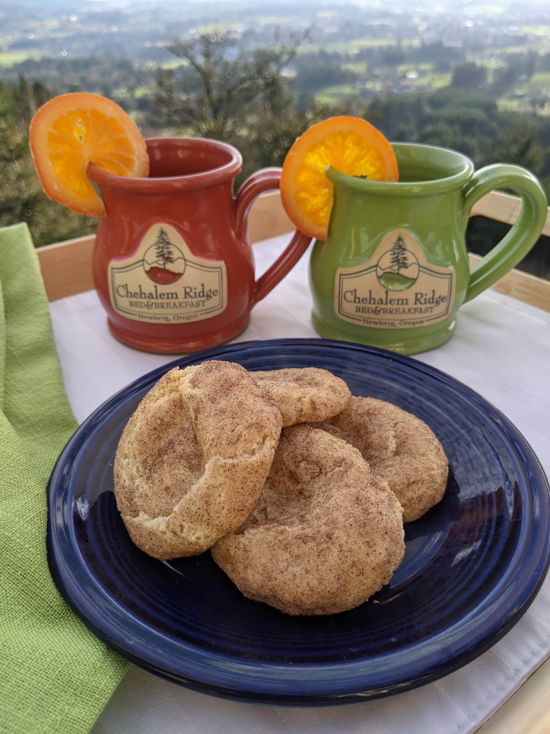 Orange and green mugs with Mulled Wine at sweets