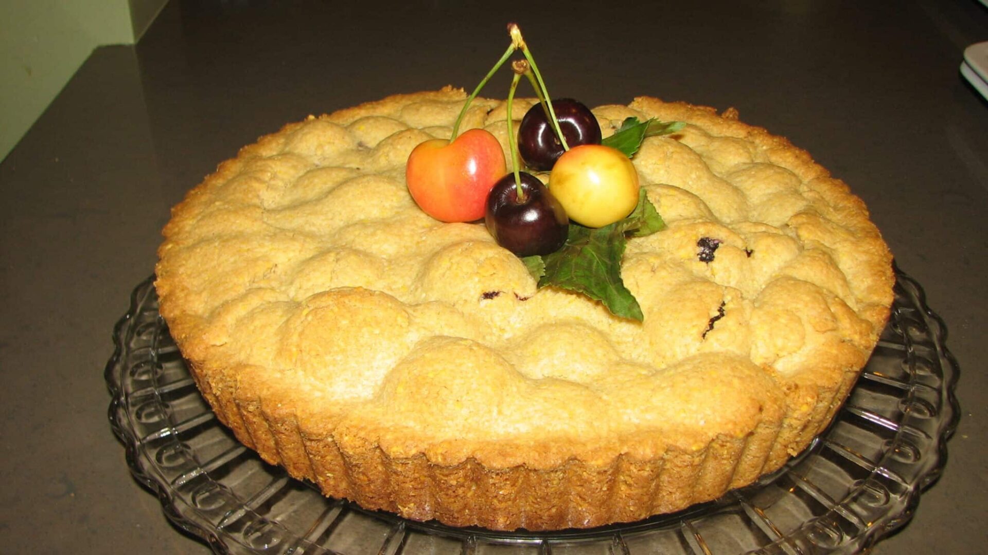 Cherry Tart on a glass serving platter