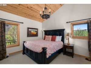 Large Franziska Guest Room dark wood bed frame, white bed spread