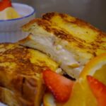 Creamy Orange French toast with yogurt and strawberries