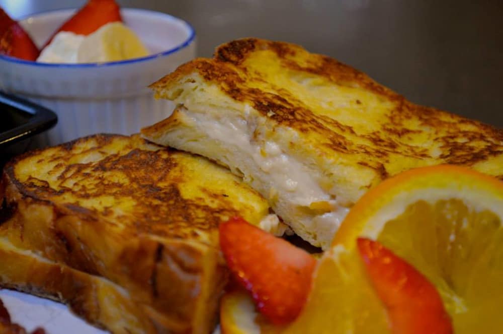 Creamy Orange French toast with yogurt and strawberries