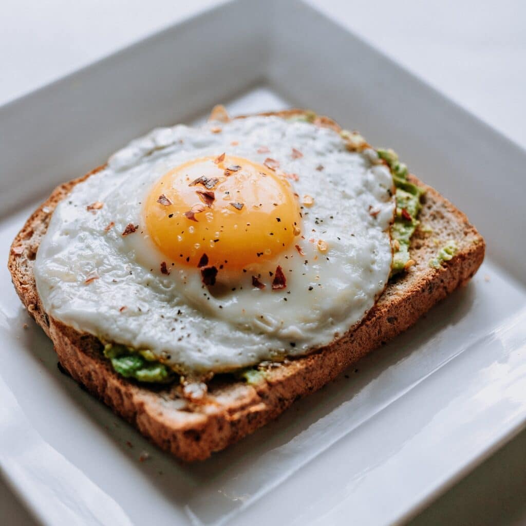 Sunny side up egg on Avocado Toast