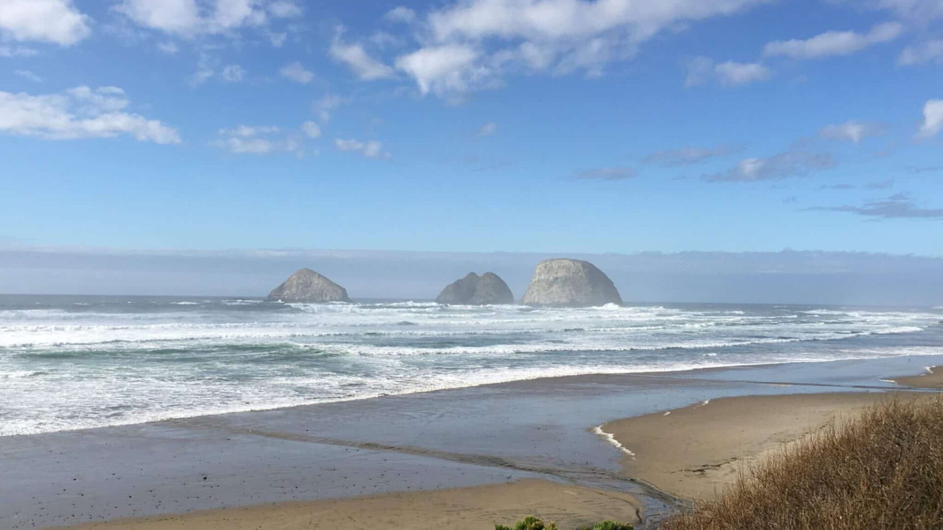 Scenic beach scene at Three Rock Arch Rocks on the Oregon Coast