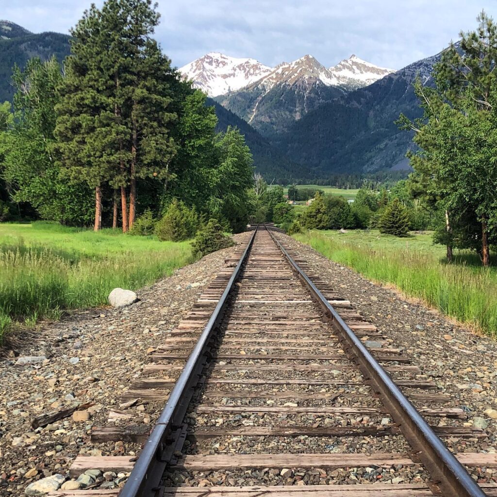 A view of the Wallowas down the tracks 