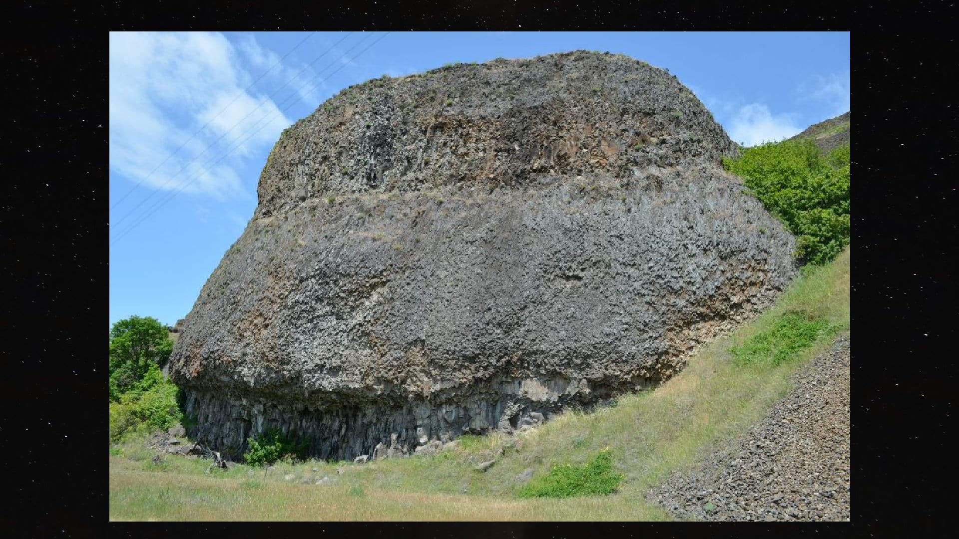 Image of a massive basalt rock formation shaped like a Mushroom