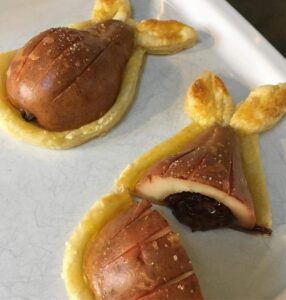 Gourmet Pears with their Melting Chocolate Heart on a white plate
