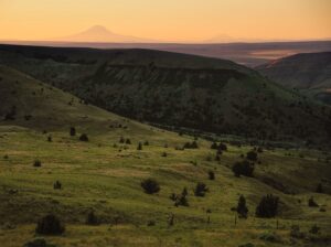 A mountain View sunset across Wilson Ranches high desert hils
