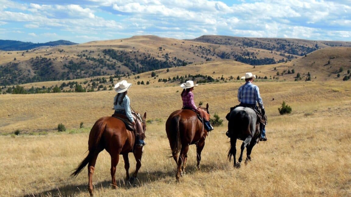 riding horseback with Wilson Ranches Retreat