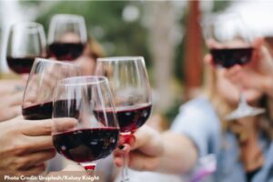 friends toasting with red wine