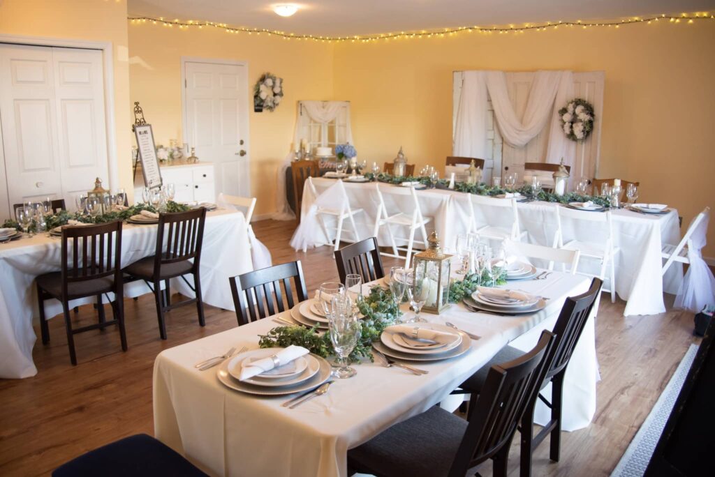 Carriage House at MaMere's table set for a formal event